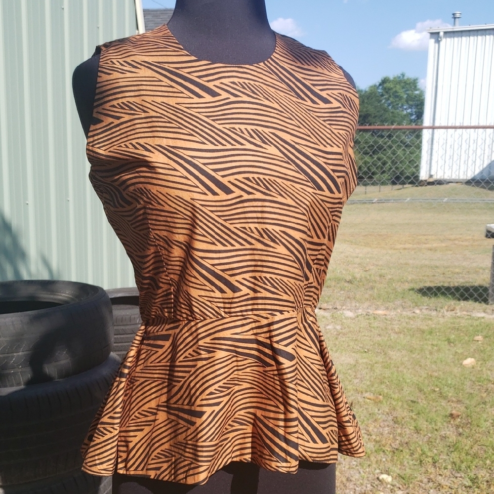 Sleeveless Peplum Blouse in Brown with Black Print